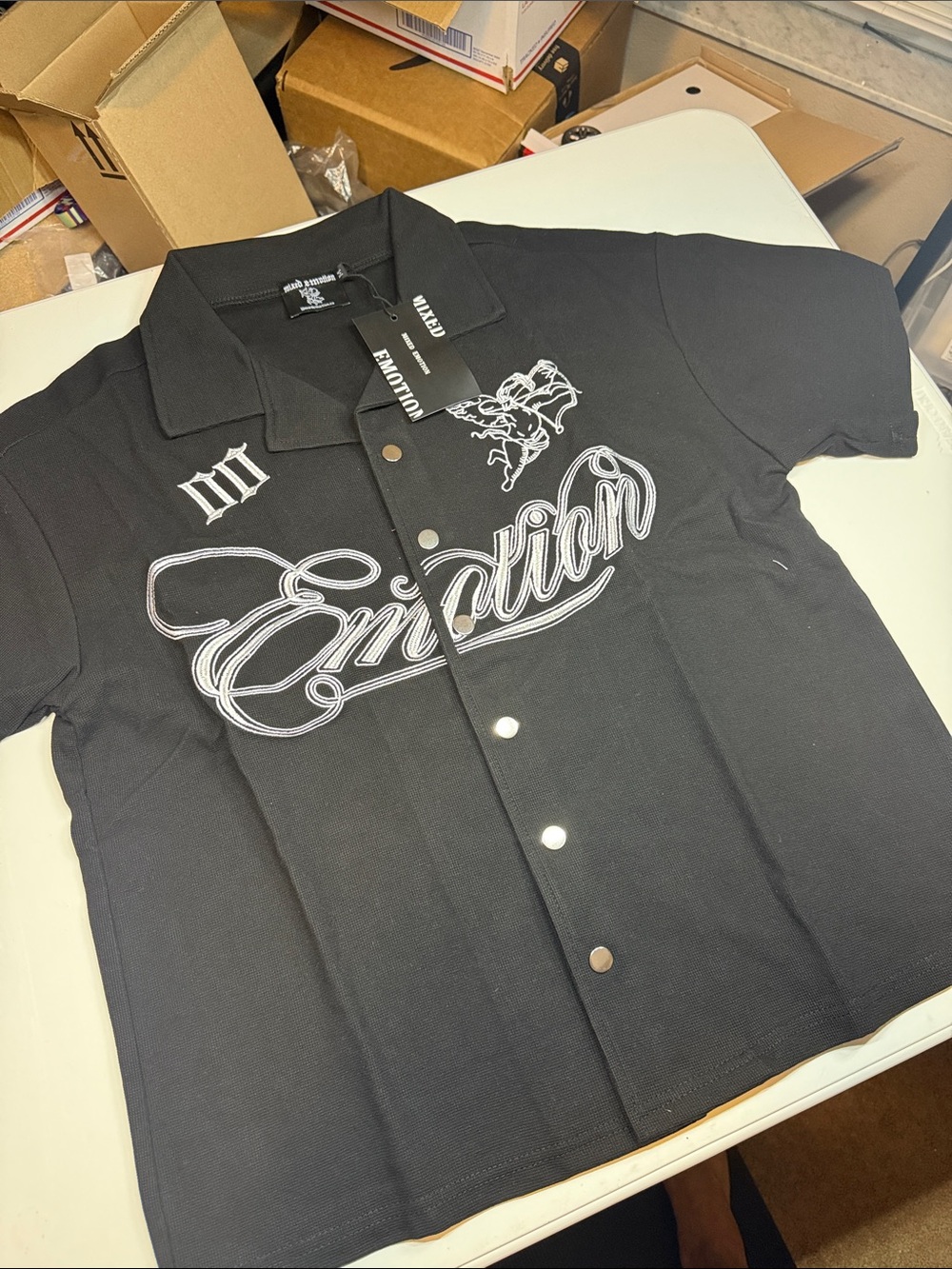 Mixed emotion button up